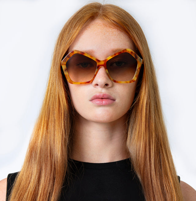 Model with straight red hair wearing Barbra 55 Sunglasses Amber with Brown Flat Gradient