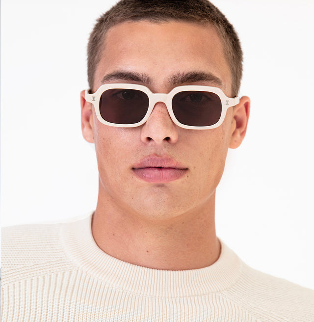 Model with buzzcut hair wearing Berlin Sunglasses Cream with Brown
