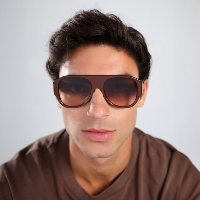 Man with brown hair in a brown tee wearing Colorado Sunglasses Espresso with Brown Gradient