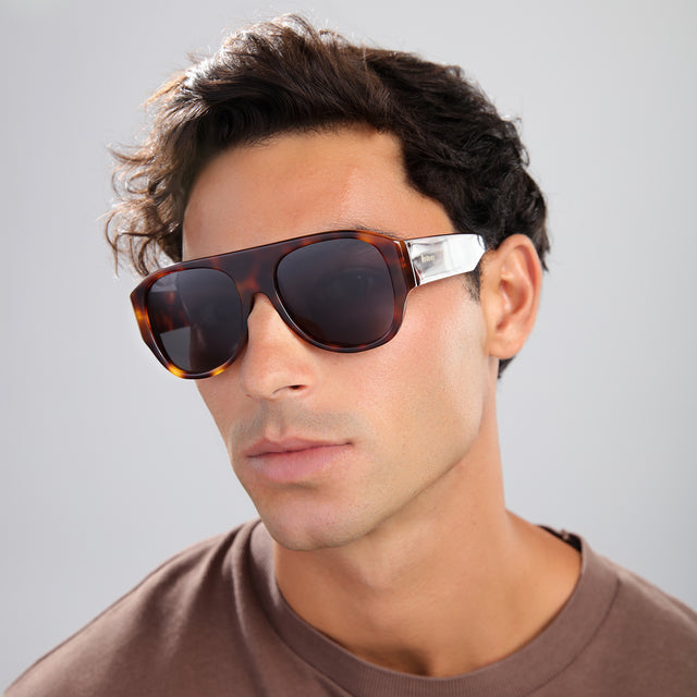 Man with brown hair in a brown tee wearing Colorado Sunglasses Havana with Grey