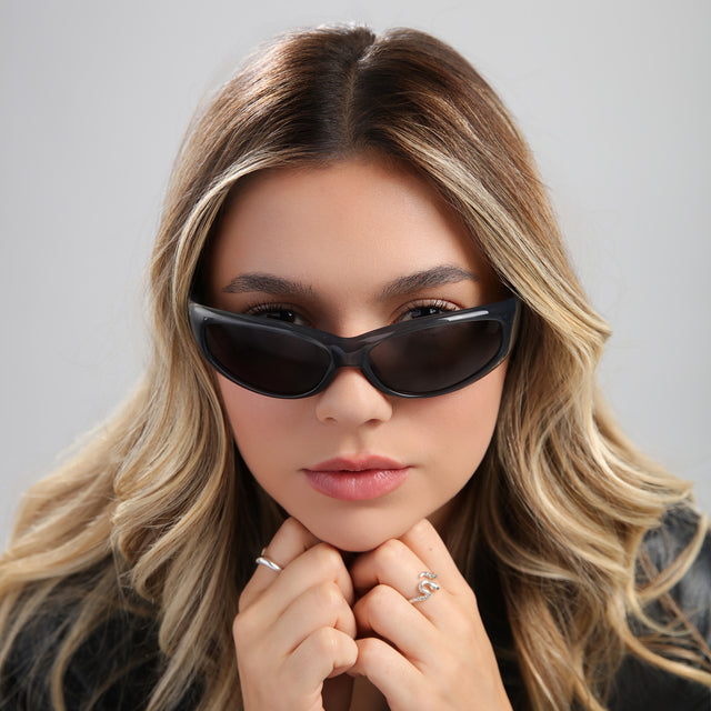 Another angle of woman with highlights wearing Granada Sunglasses Graphite
