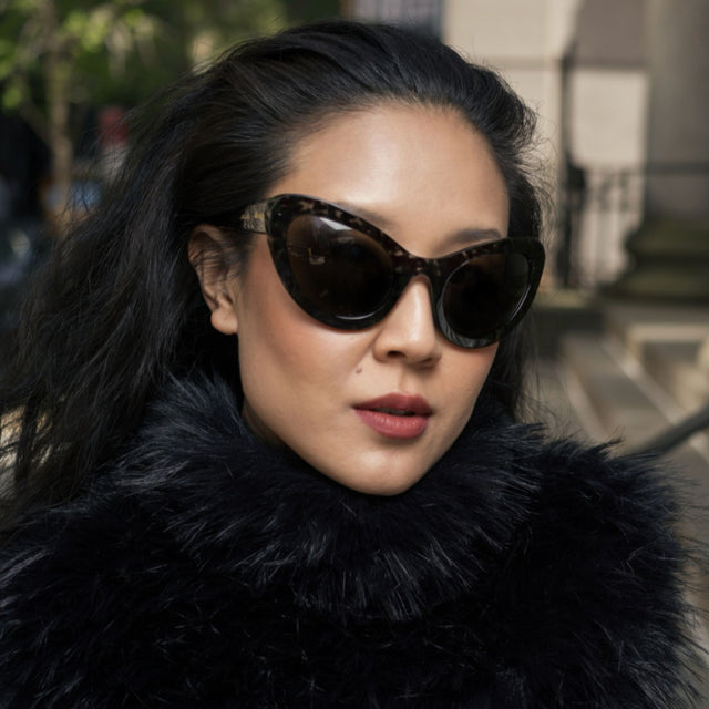 Kim Shui on a walk in New York wearing Kim Shui x illesteva Charcoal with Grey