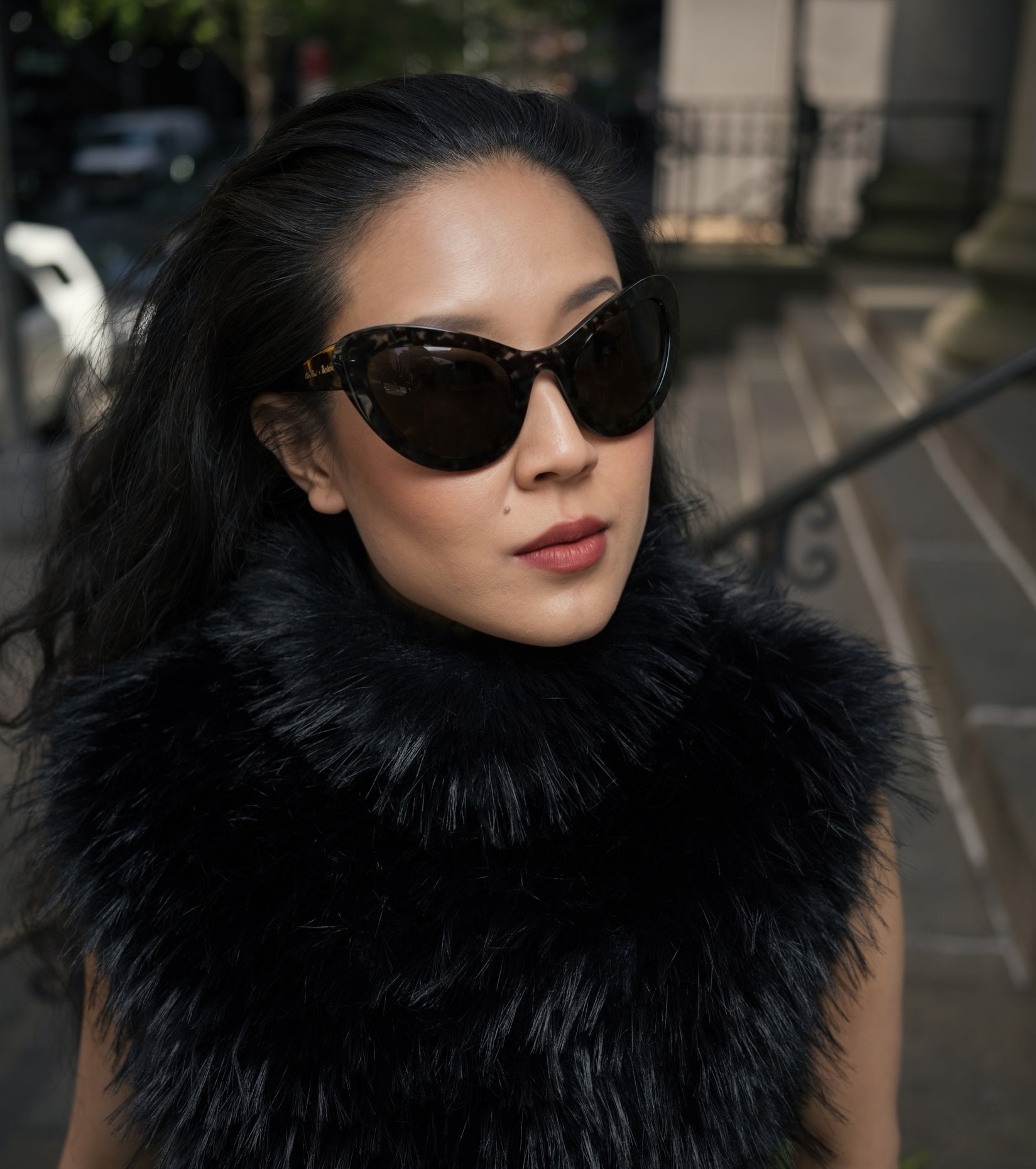 Kim Shui on a walk in New York while wearing the Kim Shui x illesteva Sunglasses in Charcoal with Grey