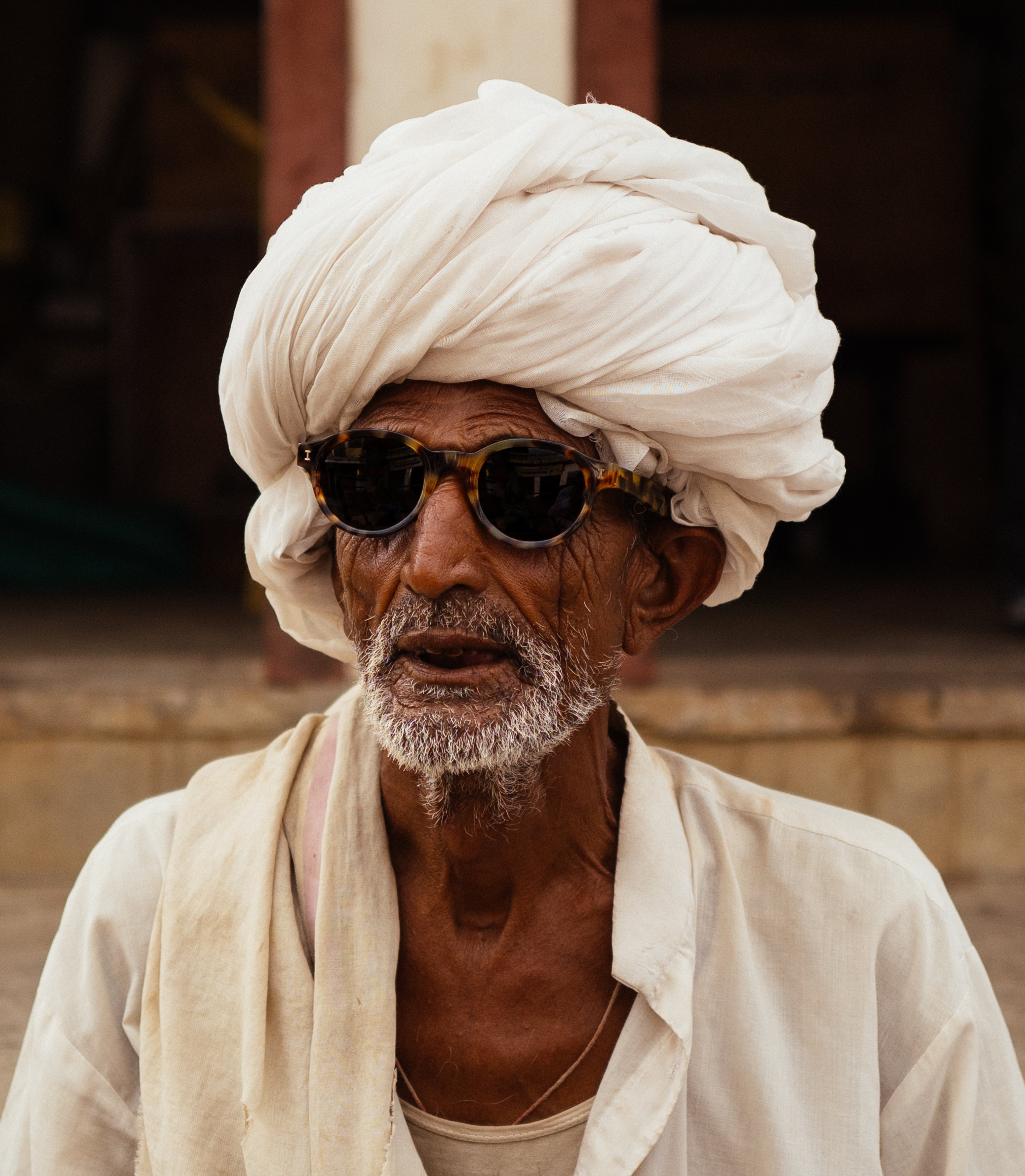 Man in turban wearing Medellin in Tortoise with Grey lenses