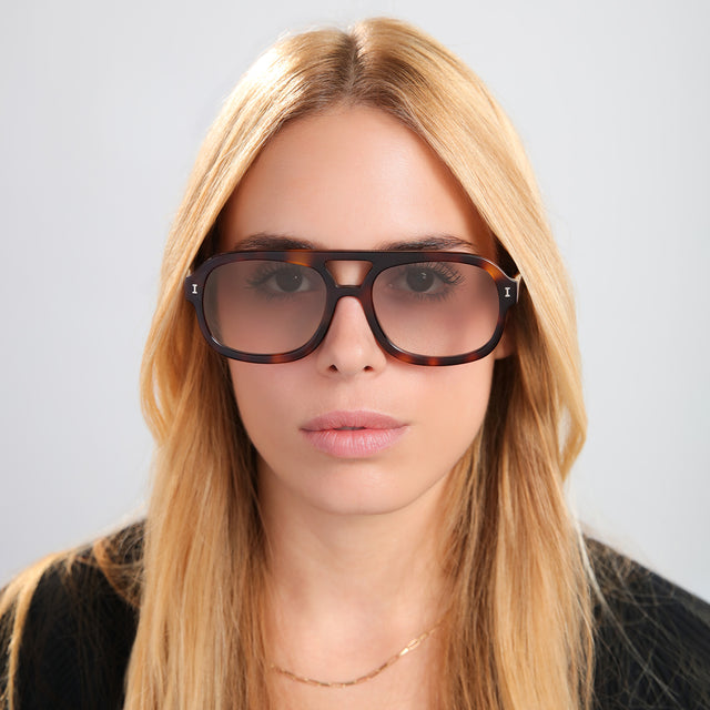 Another angle of blond woman wearing Memphis Sunglasses Havana with Taupe Gradient