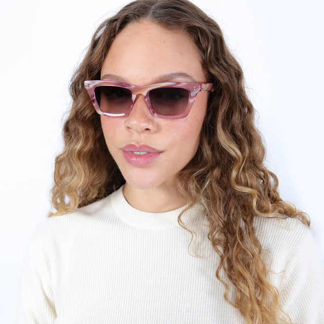 Brunette model with ombré hair wearing Portugal Sunglasses Monte Rosa with Grey Flat Gradient