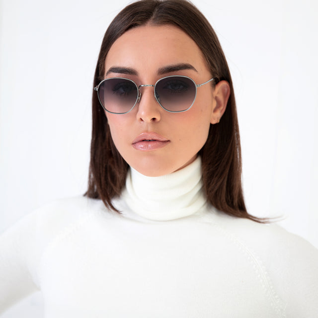 Brunette model with straight hair wearing Prince Sunglasses Gunmetal with Grey Flat Gradient