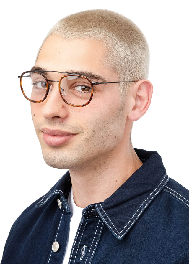 Blonde man with buzzcut wearing Corfu Optical Havana/Black Optical