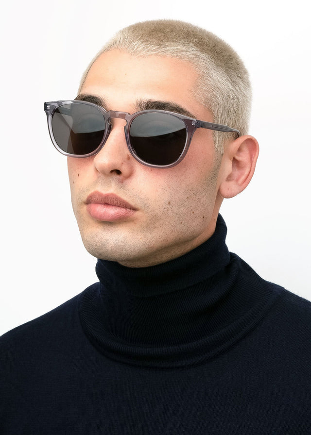 Model with blonde buzzcut  wearing Eldridge Sunglasses Mercury with Grey Flat