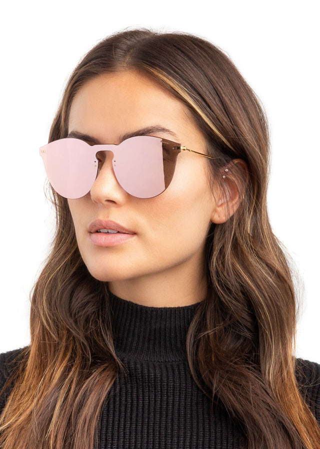 wearing Leonard II Mask Sunglasses Bright Rose with Bright Rose