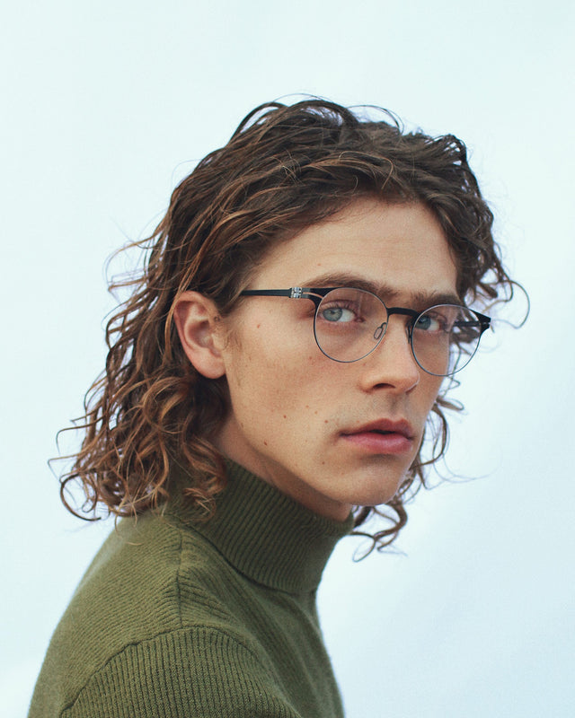 men fit model wearing Bond Titanium Optical glasses in Matte Black