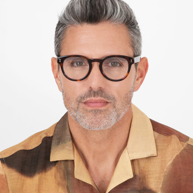 Model with salt and pepper hair and beard wearing Atlantic Optical Havana Optical