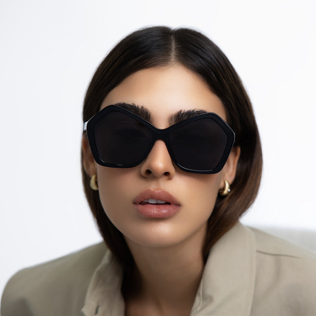 wearing Barbra 55 Sunglasses Black with Grey Flat
