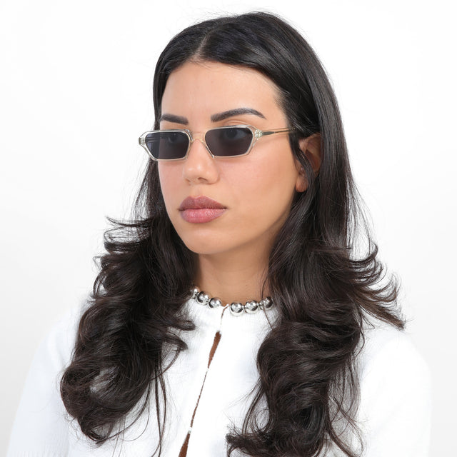 Model wearing Baxter Sunglasses in Champagne