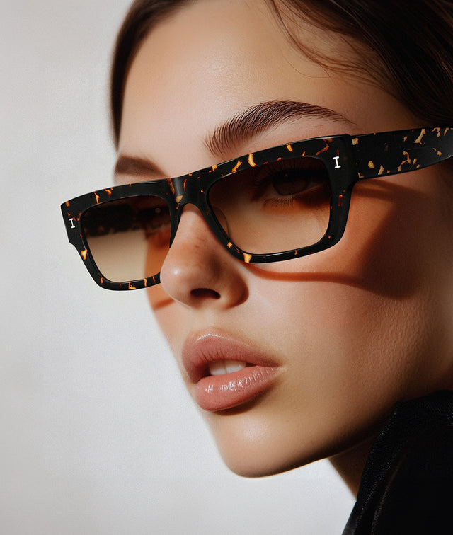 Model wearing Belluna Sunglasses in Flame