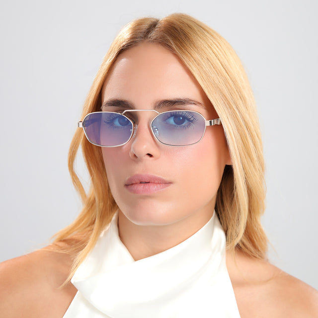 Another angle of blond woman in a silk white halter top wearing Bimini Sunglasses Gold/Havana with Blue Flat Gradient See Through