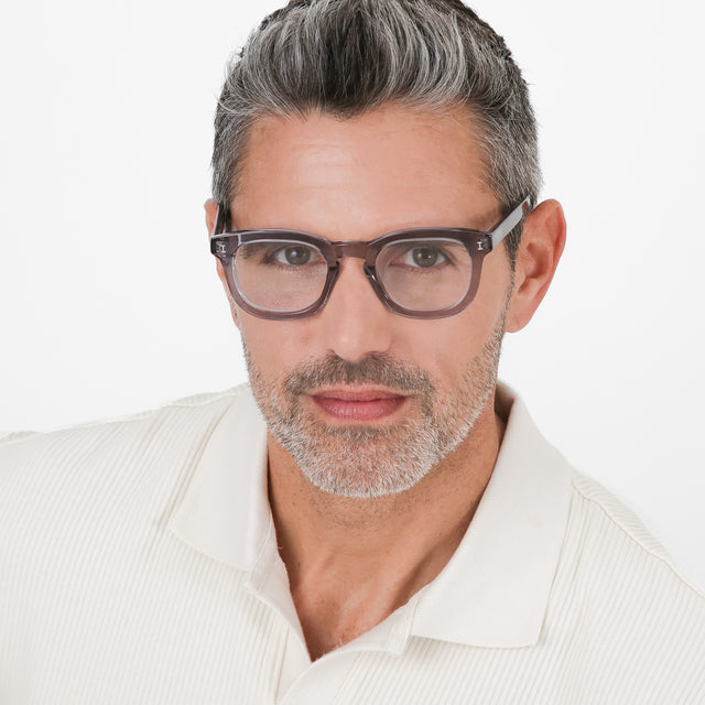 Model with salt and pepper hair and beard wearing Boston Optical Mercury Optical