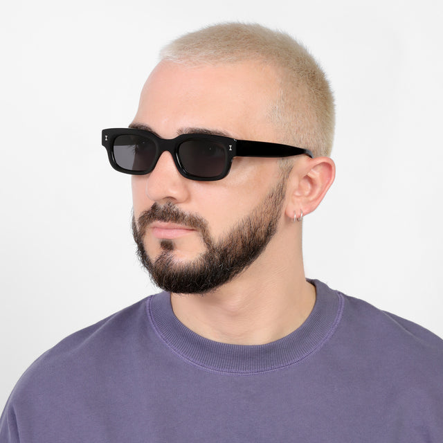 Bearded model looking right wearing Cali E Sunglasses Black with Grey