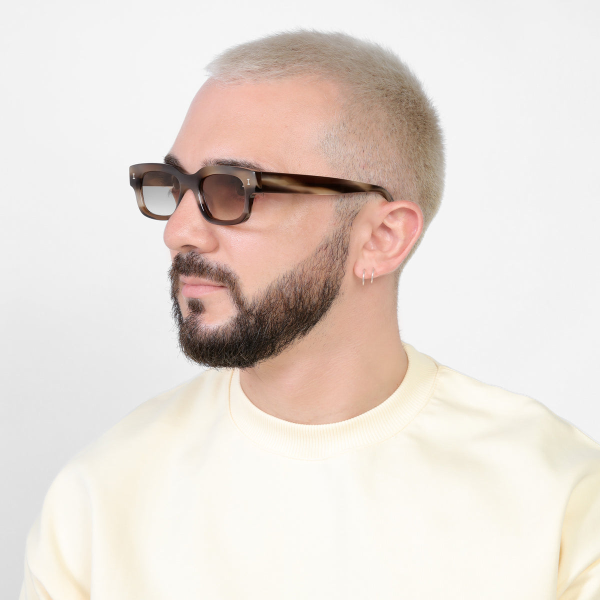 Man wearing Cali E Sunglasses in Java with Taupe Gradient lenses, Bearded model looking right