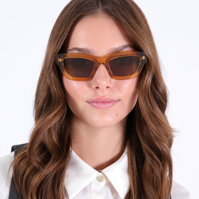 Brunette in a collared blouse wearing Donna Sunglasses Cider/White Tortoise with Brown Gradient