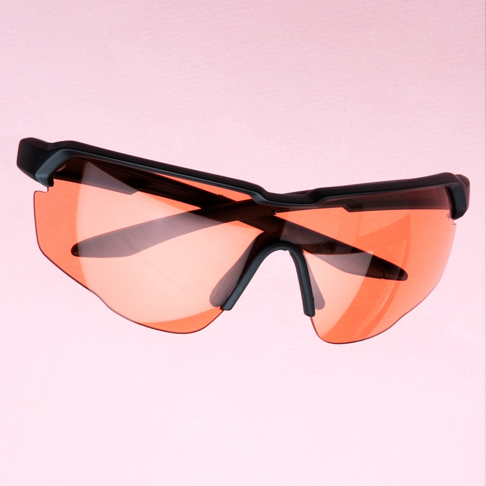 Dune x illesteva sporty sunglasses shown with orange lenses