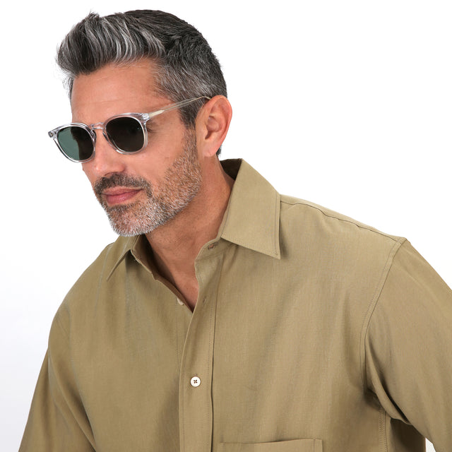 Model with salt and pepper hair and beard wearing Eldridge Sunglasses Clear with Olive Flat
