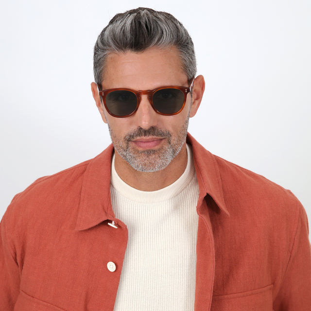 Model with salt and pepper hair and beard wearing Eldridge Sunglasses Red Havana with Olive Flat