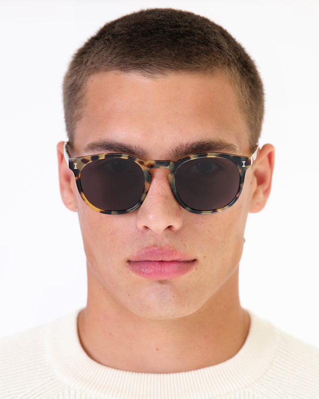 Model with buzzcut wearing Eldridge Sunglasses Tortoise with Grey Flat