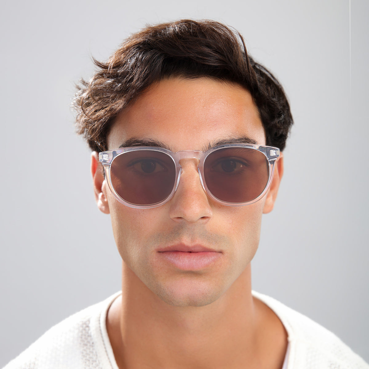 Man wearing Eldridge 56 Sunglasses in Champagne with Brown Flat lenses, front view, Man with brown hair in a white tee