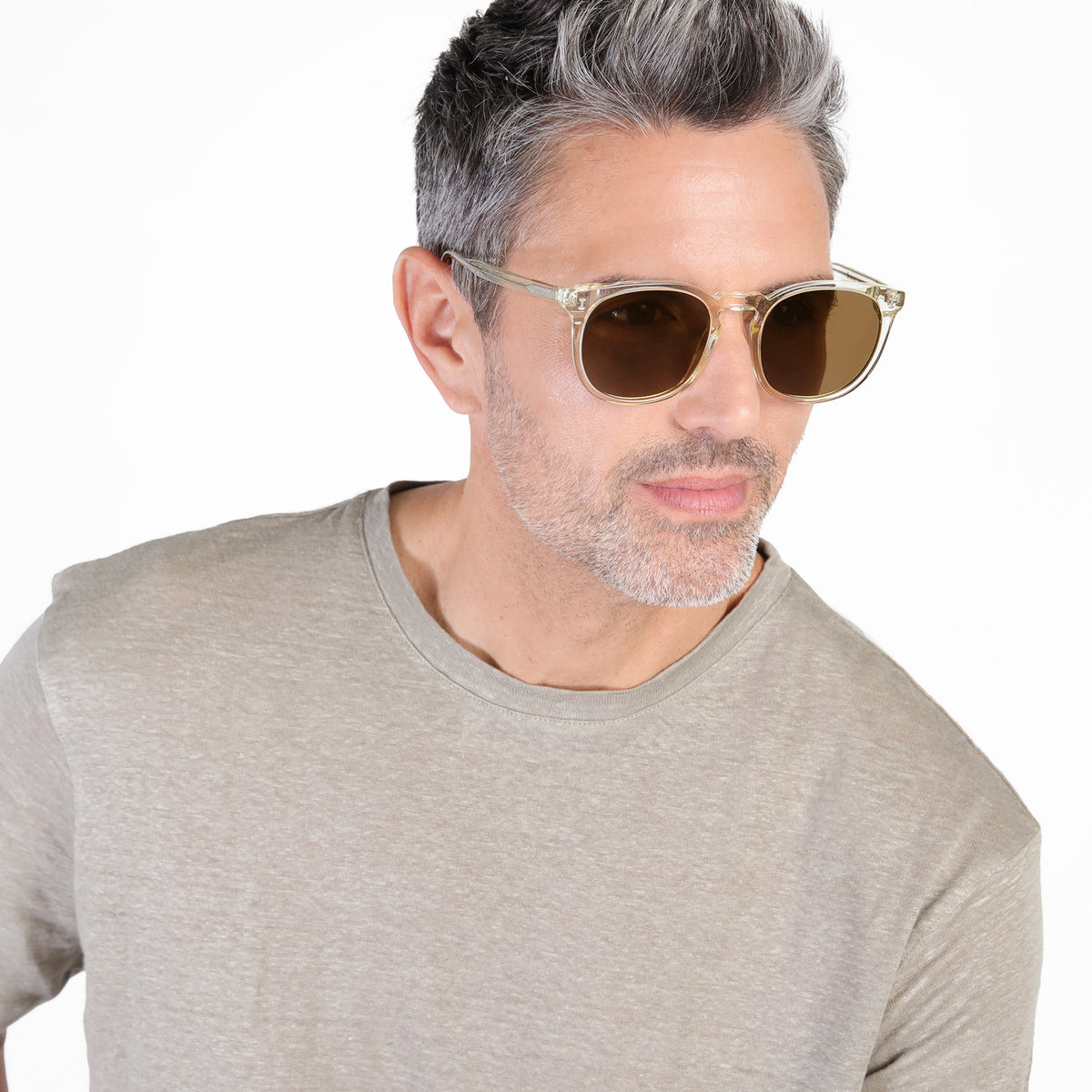 Man wearing Eldridge 56 Sunglasses in Champagne with Brown Flat lenses, Model with salt and pepper hair and beard