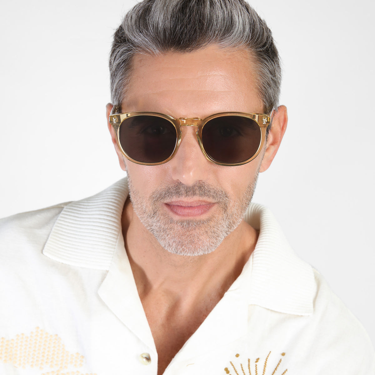 Man wearing Eldridge 56 Sunglasses in Citrine with Grey Flat lenses, Model with salt and pepper hair and beard