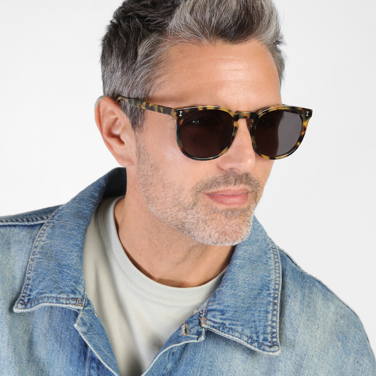 Man wearing Eldridge 56 Sunglasses in Tortoise with Grey Flat lenses, Model with salt and pepper hair and beard
