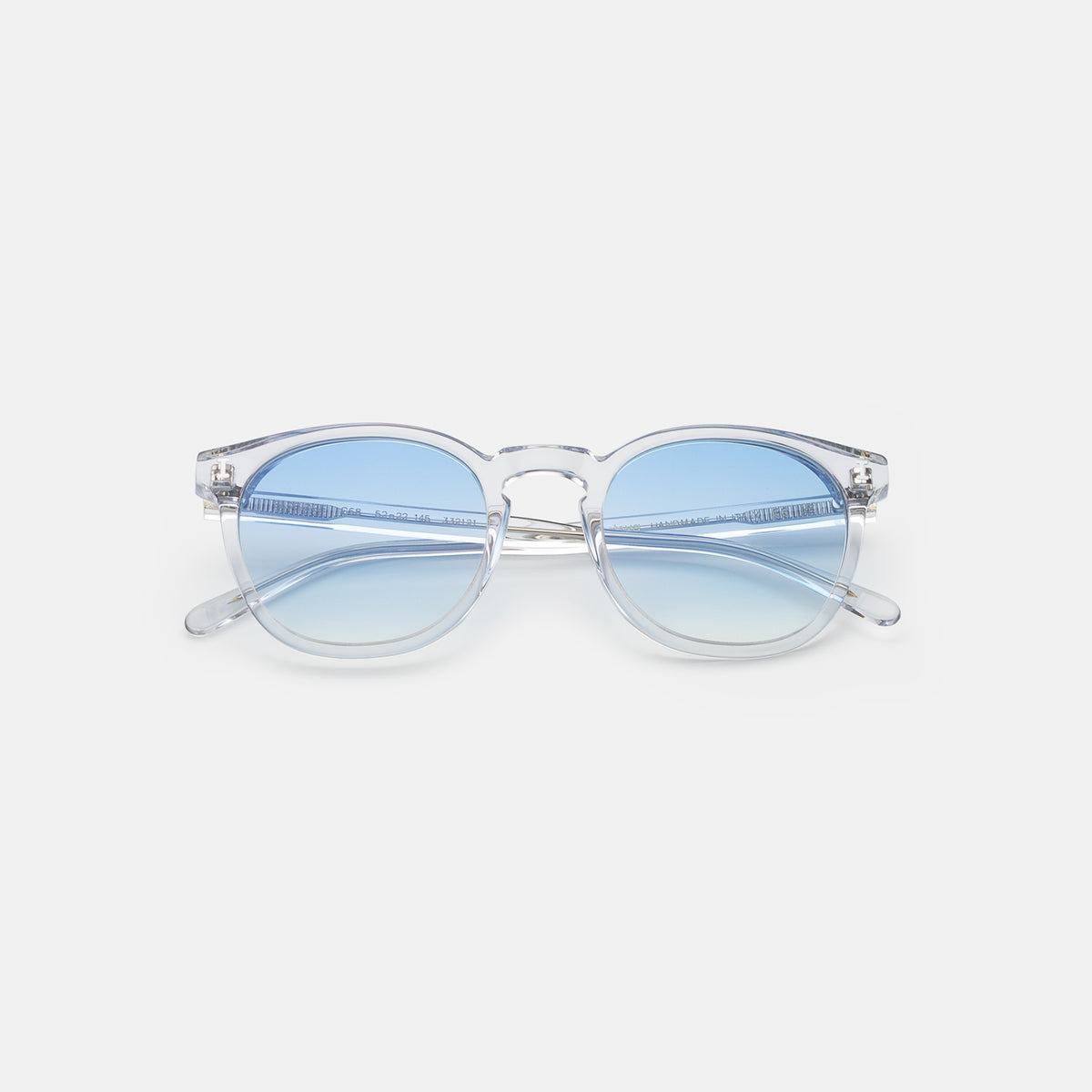 Eldridge Sunglasses in Clear with Blue Flat Gradient See Through lenses