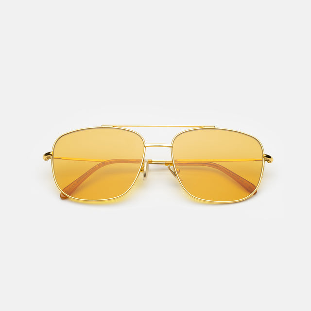 Frankie Sunglasses side view in Gold / Honey Flat See Through
