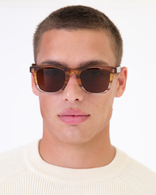 Model with buzzcut wearing James Sunglasses Golden Cedar with Brown