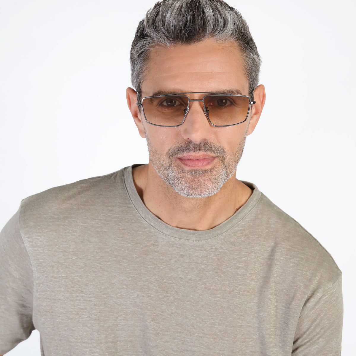 Man wearing Jane Sunglasses in Gunmetal with Taupe Gradient lenses, Model with beard