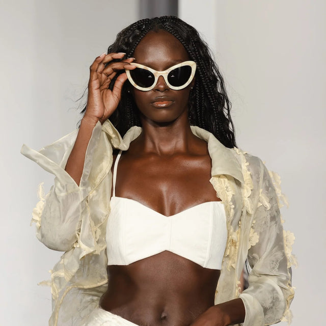 Kim Shui Sunglasses worn by a model at NYFW Spring Summer 26 wearing Kim Shui x illesteva Savannah Cream Marble with Grey 