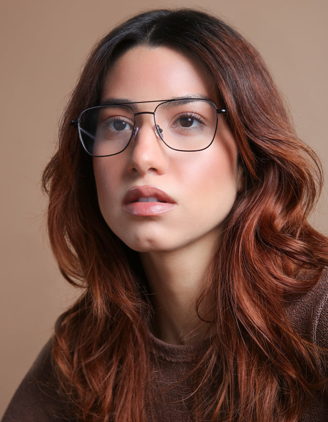 Woman with red hair wearing the Lafayette Optical in Black