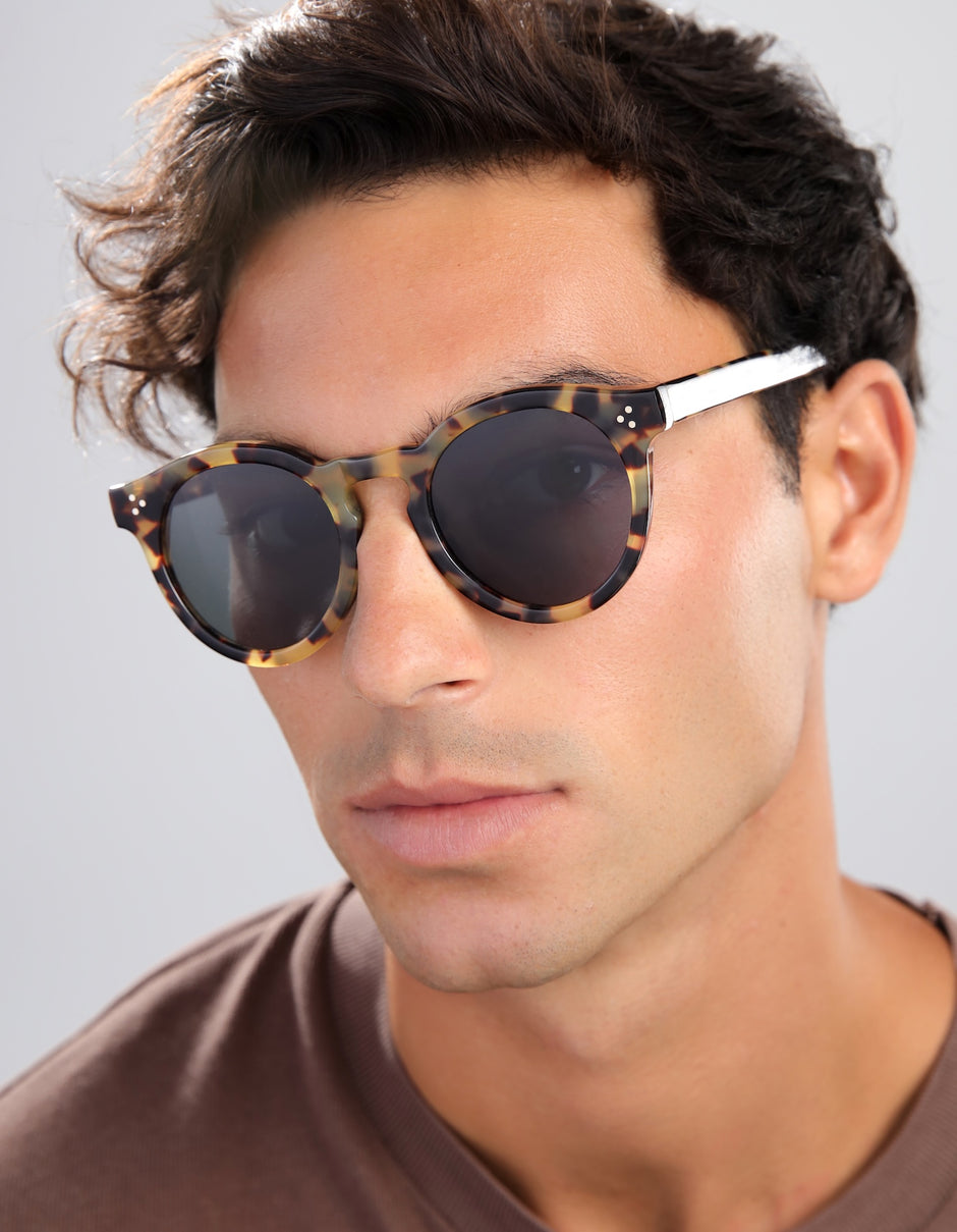 Man in a brown shirt wearing the Leonard II E in Tortoise