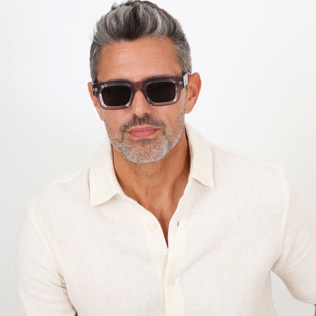Model with salt and pepper hair and beard wearing Lewis Sunglasses Mercury with Grey Flat