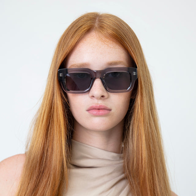 Model with straight, red hair wearing Lewis Sunglasses Mercury with Grey Flat