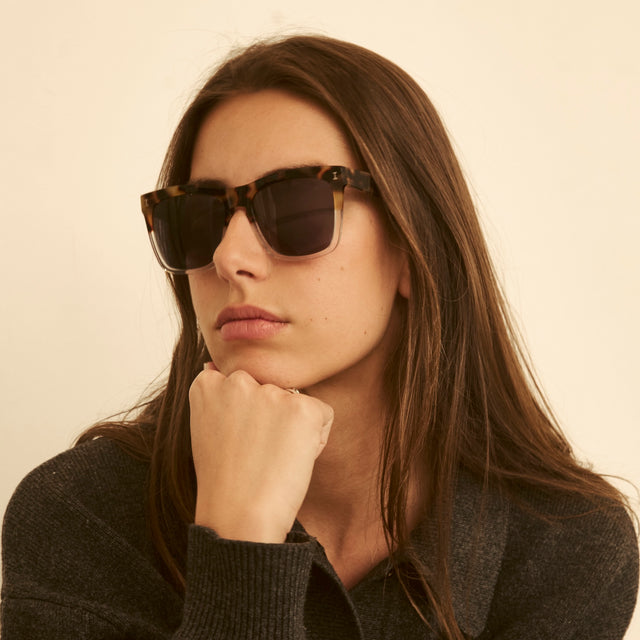 Woman in a cashmere blouse wearing Los Feliz Sunglasses Half Half Tortoise with Grey