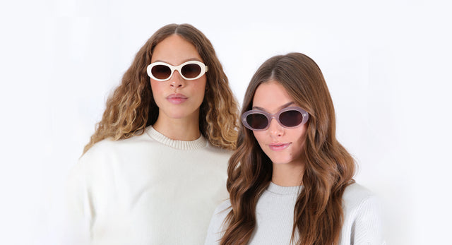 Two models wearing Luna Sunglasses in Cream and Thistle