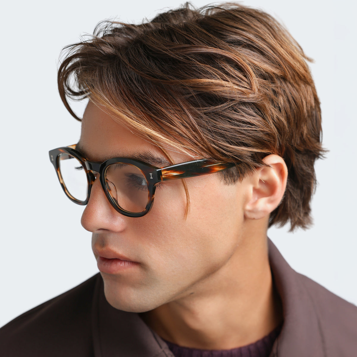 Man wearing Madison Optical in Sand Dune Optical, side profile, Man looking right