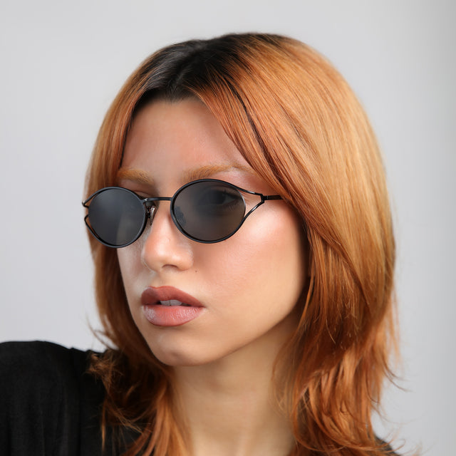 Another angle of model with red hair wearing Maria Sunglasses Black with Grey