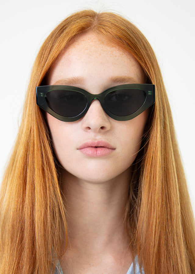 Red Haired Woman wearing Mary Lou 51 Sunglasses Pine with Grey Flat