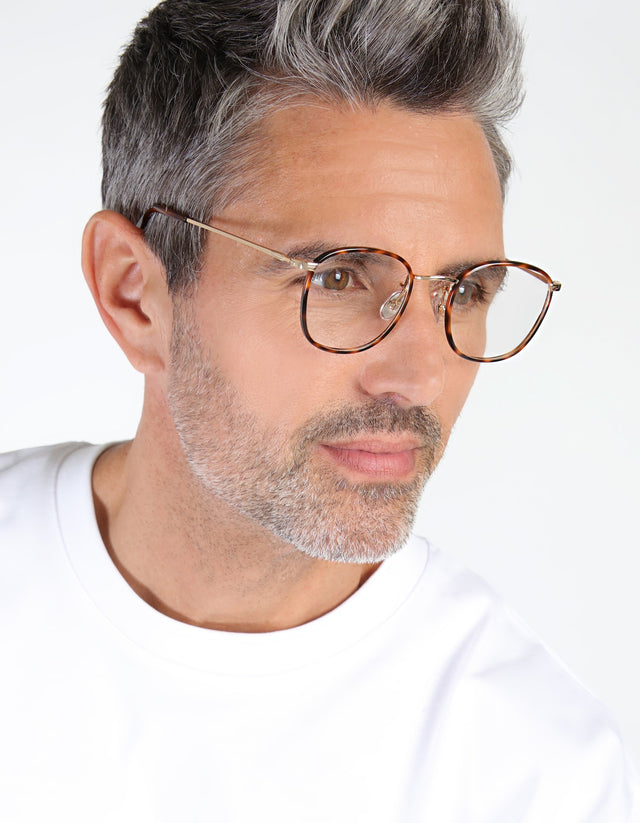 Man with salt and pepper hair and beard wearing the Mayfair Optical in Havana/Gold