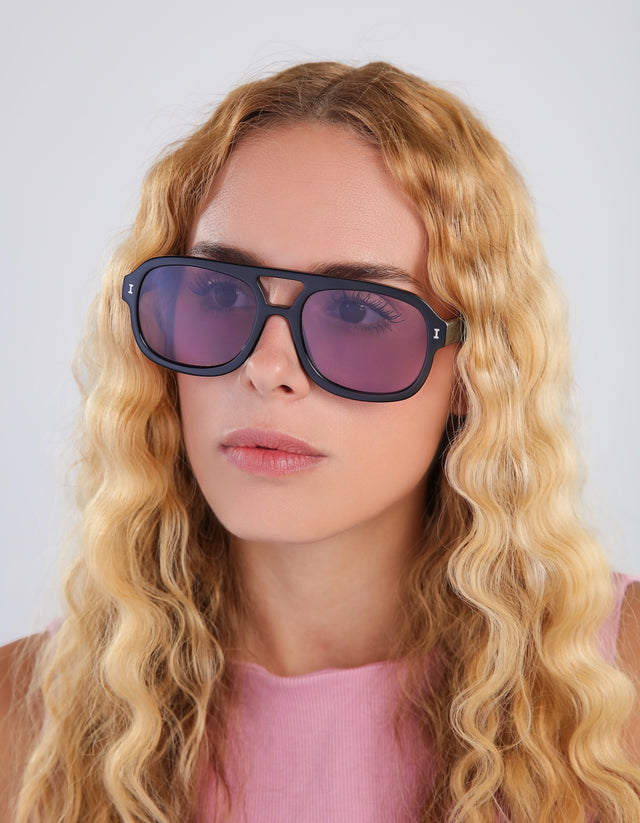 Blonde woman wearing Memphis in Black with Plum See Through