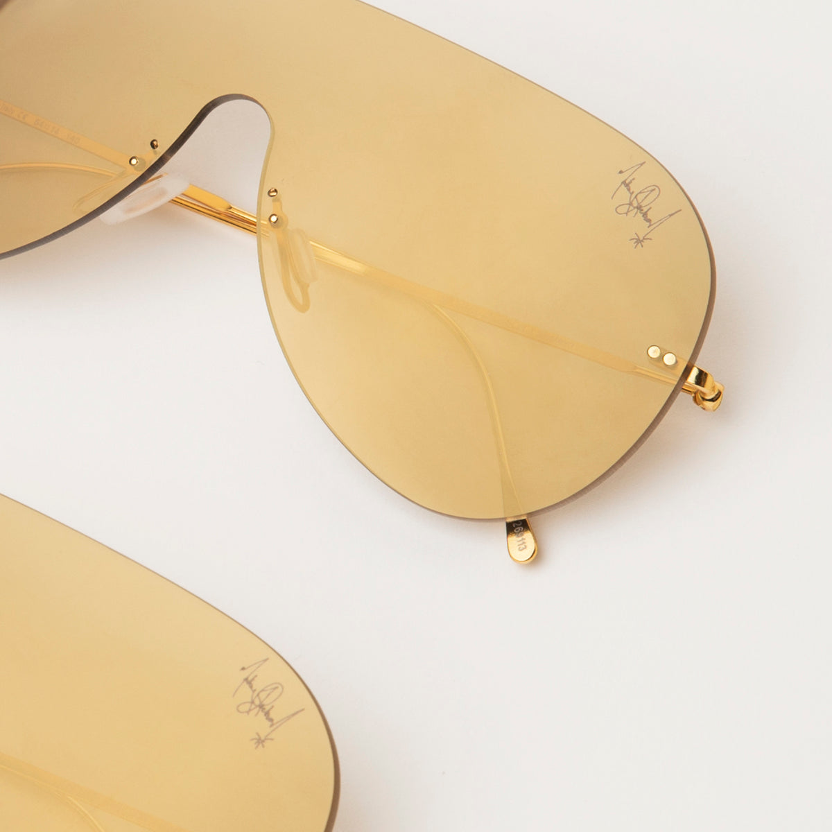 Closeup of collaboration frames in gold
