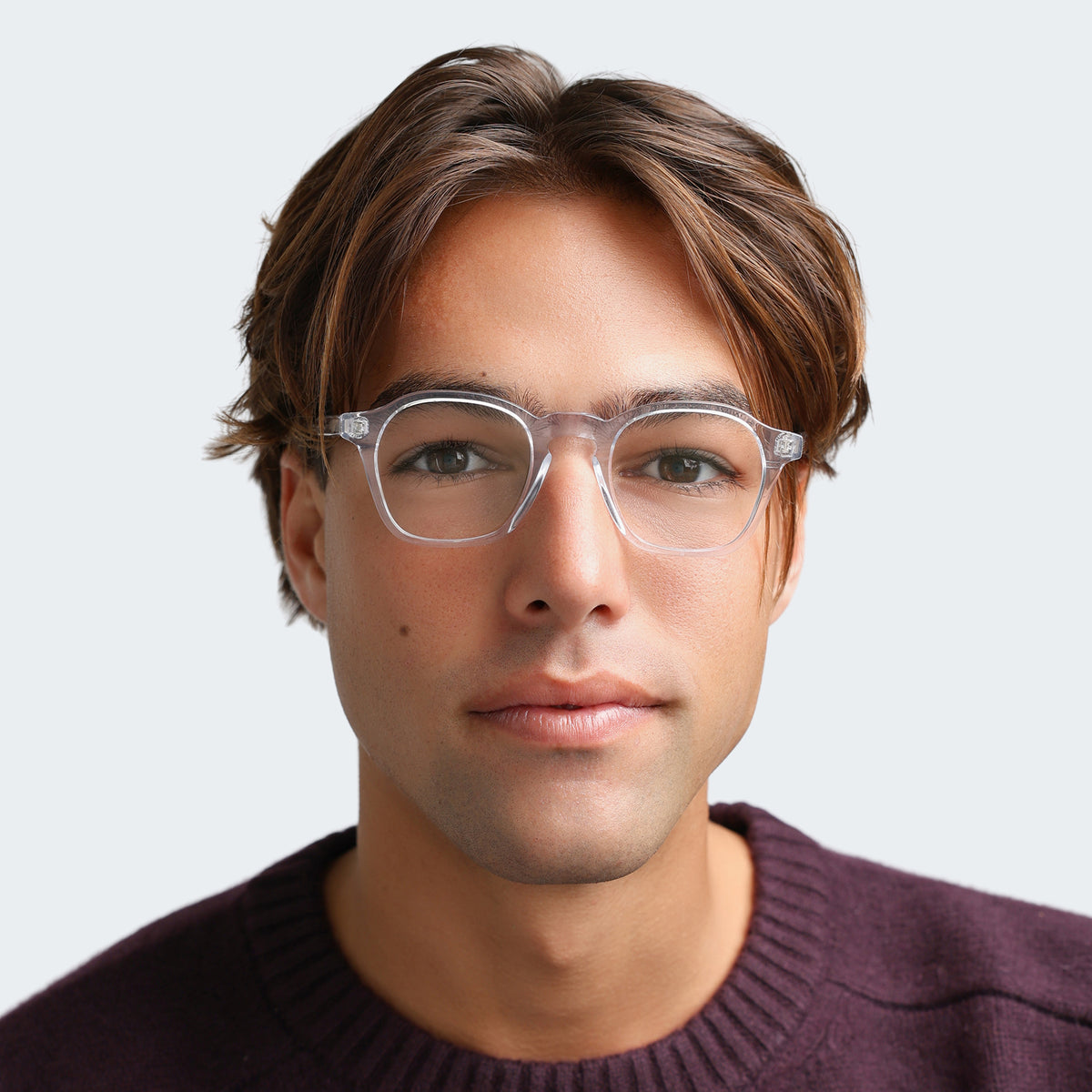Model wearing Nash Optical in Clear Optical, front view, Man in a plum sweatshirt